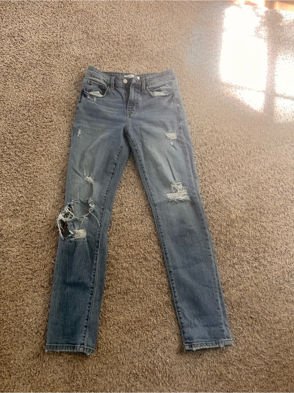 Women’s Distressed Skinny Jeans in Blue